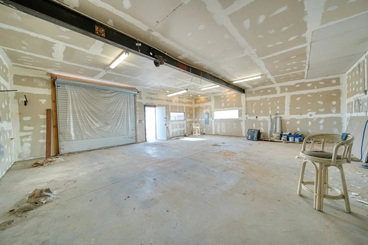 Interior lined with gypsum board, joints taped and ready for finishing