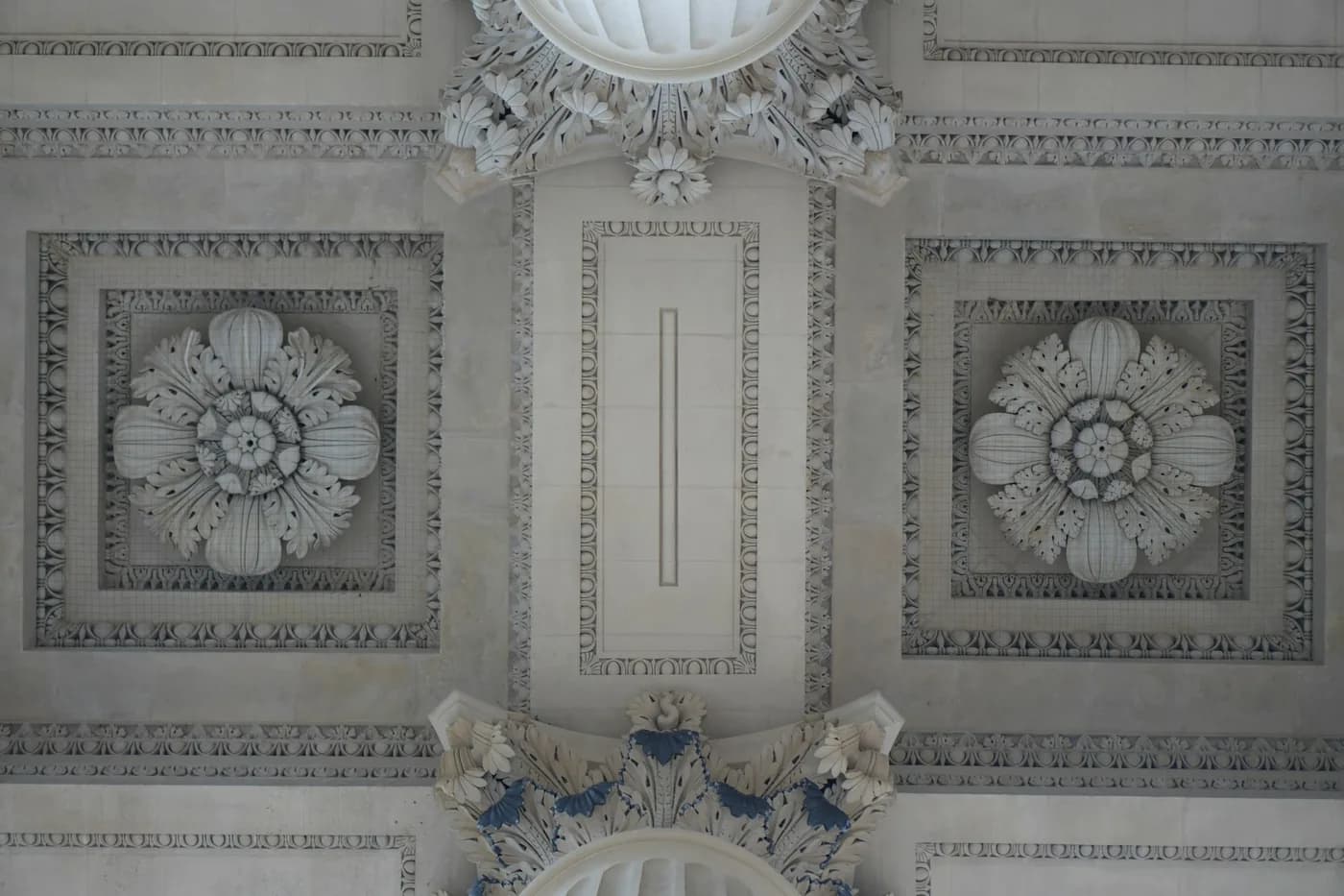 Decorative plaster ceiling with moulded rosettes